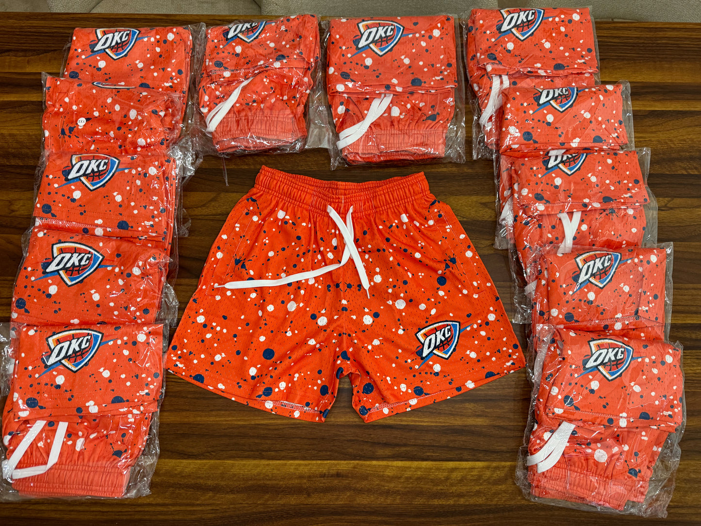 Orange thunder splatter shorts