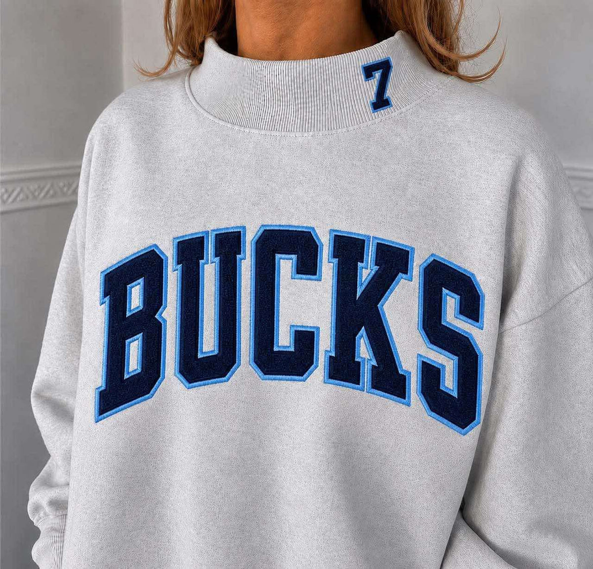 Buck embroidered mockneck
